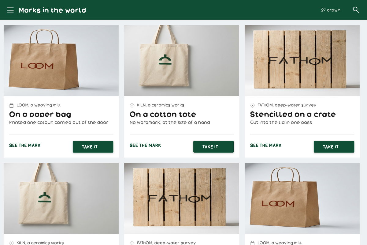 Flat 2.0: a card grid of the foundry's marks in use. A flat green app bar with a drawn menu and search, three flat white cards each holding a photograph, a kicker with a small drawn mark, a title, a line of body and a divider, and two actions side by side: one flat green text action and one raised green button carrying the only shadow on the page. A second row of cards is cut by the bottom edge.