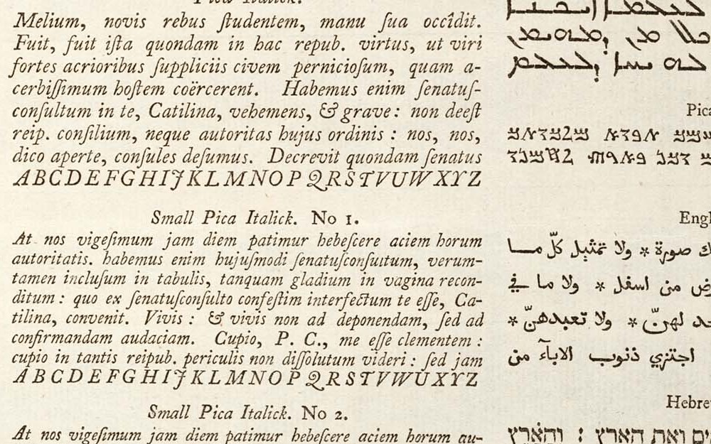 Swash: the italic capitals of Caslon's 1734 specimen, several with extended decorative strokes.